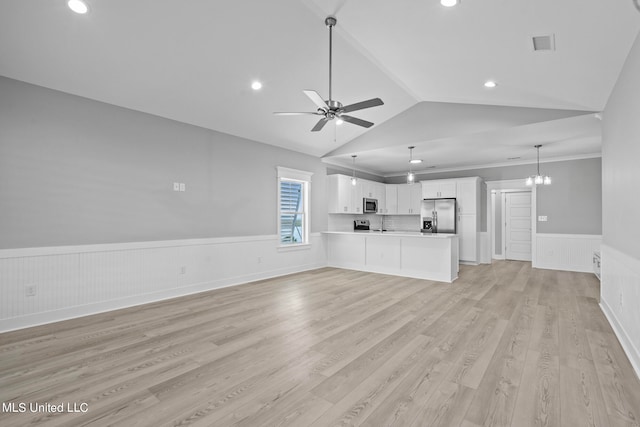 unfurnished living room featuring ceiling fan, light wood-type flooring, and lofted ceiling