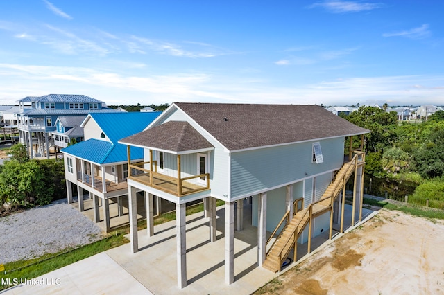 back of property featuring a patio