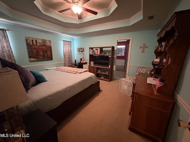 9831 Crooked Creek Blvd, Byram, MS 39272 - bedroom with ornamental molding, a raised ceiling, light carpet, and ceiling fan