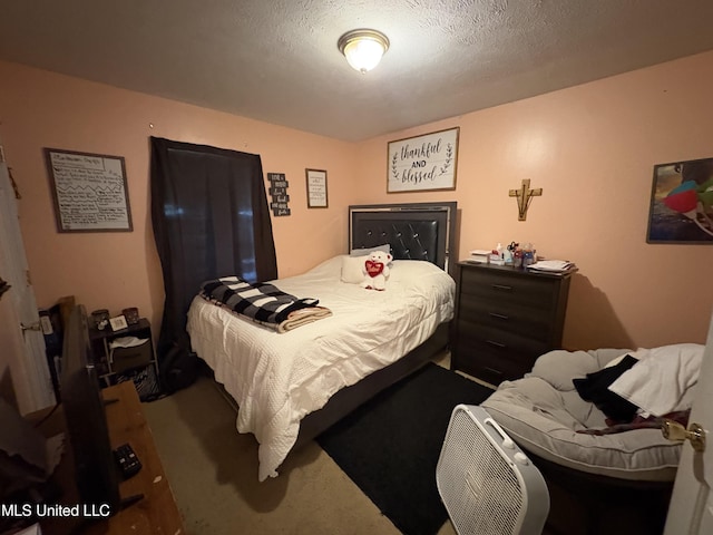 9831 Crooked Creek Blvd, Byram, MS 39272 - bedroom with carpet floors and a textured ceiling