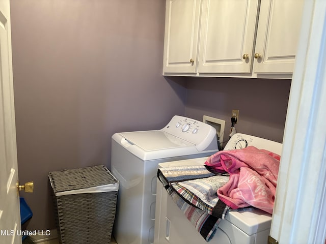 9831 Crooked Creek Blvd, Byram, MS 39272 - laundry area featuring separate washer and dryer and cabinet space