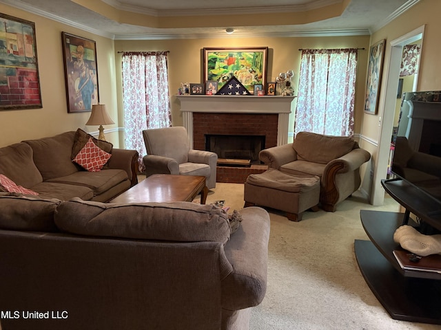 9831 Crooked Creek Blvd, Byram, MS 39272 - living room featuring ornamental molding, a brick fireplace, a raised ceiling, and carpet flooring