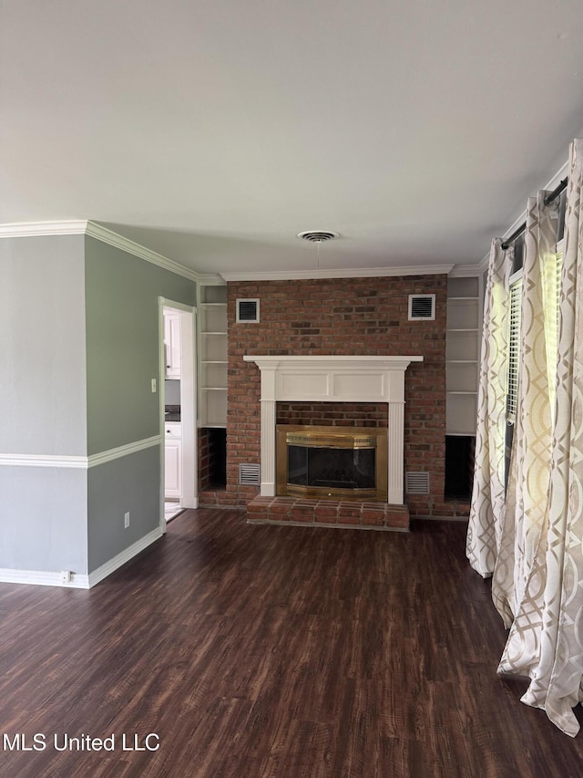 unfurnished living room featuring baseboards, built in features, wood finished floors, and a fireplace