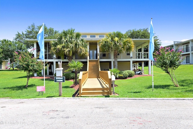 3230 Cumberand Rd Unit 56, Ocean Springs, MS 39564 - view of front of home featuring a front lawn and stairway