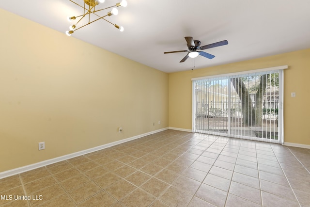 3230 Cumberand Rd Unit 56, Ocean Springs, MS 39564 - empty room with a chandelier, light tile patterned floors, baseboards, and a ceiling fan