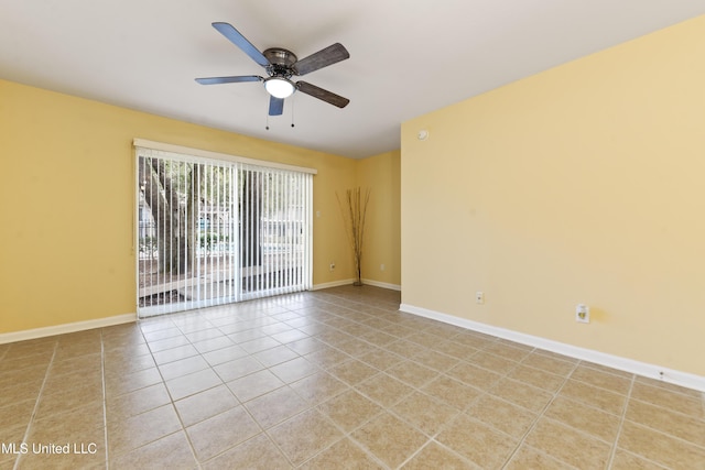 3230 Cumberand Rd Unit 56, Ocean Springs, MS 39564 - empty room with a ceiling fan, light tile patterned floors, and baseboards