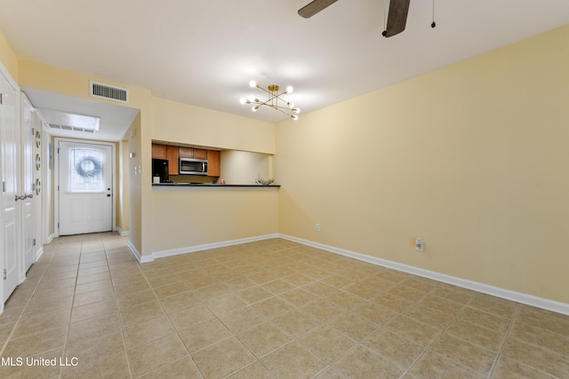 3230 Cumberand Rd Unit 56, Ocean Springs, MS 39564 - foyer with a ceiling fan, baseboards, light tile patterned floors, and a chandelier