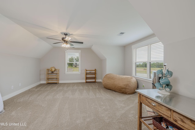 5267 Reserve Way, Hernando, MS 38632 - sitting room featuring carpet flooring, vaulted ceiling, baseboards, and a ceiling fan
