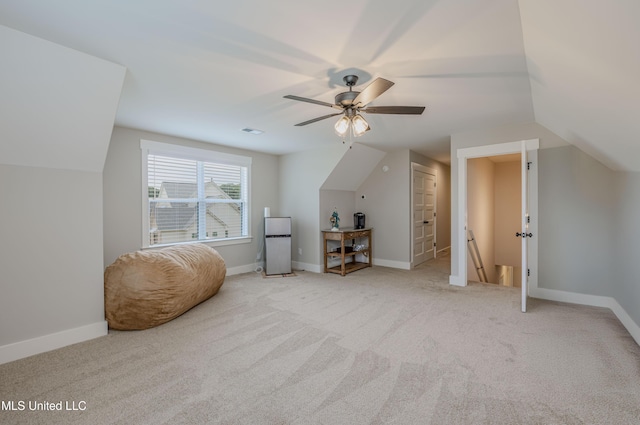 5267 Reserve Way, Hernando, MS 38632 - additional living space with ceiling fan, light carpet, lofted ceiling, and baseboards