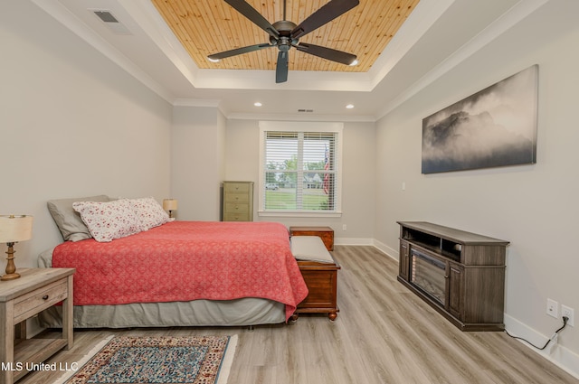 5267 Reserve Way, Hernando, MS 38632 - bedroom with a tray ceiling, light wood-type flooring, wooden ceiling, baseboards, and crown molding
