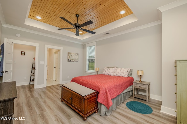 5267 Reserve Way, Hernando, MS 38632 - bedroom featuring a raised ceiling, light wood-style floors, wood ceiling, baseboards, and crown molding
