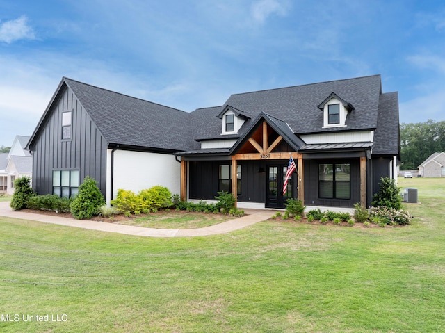 5267 Reserve Way, Hernando, MS 38632 - modern farmhouse with a front yard, roof with shingles, board and batten siding, cooling unit, and a standing seam roof