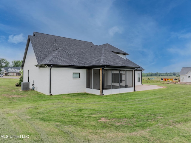 5267 Reserve Way, Hernando, MS 38632 - rear view of property with a shingled roof, a sunroom, a lawn, and central air condition unit