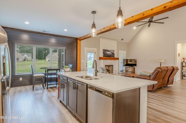 5267 Reserve Way, Hernando, MS 38632 - kitchen featuring dishwasher, open floor plan, a sink, a fireplace, and recessed lighting