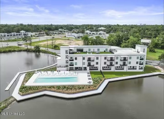 1302 Magnolia St Unit 202, Gulfport, MS 39507 - rear view of property featuring a community pool and a water view