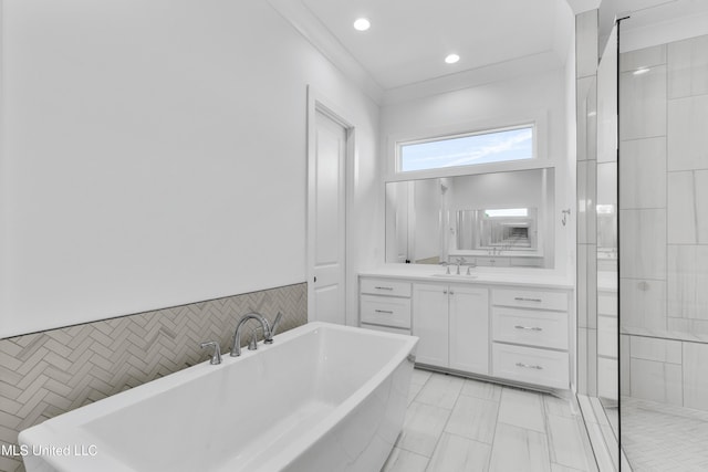 full bath with recessed lighting, vanity, tile walls, a freestanding bath, and tiled shower