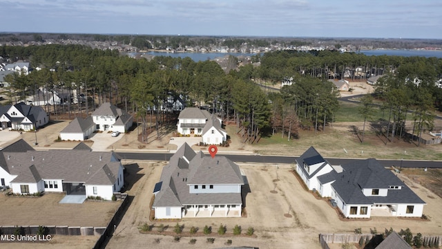 birds eye view of property with a residential view