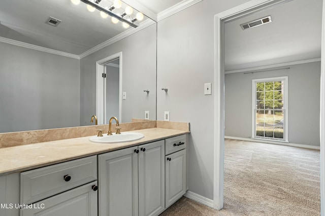 bathroom with vanity and crown molding