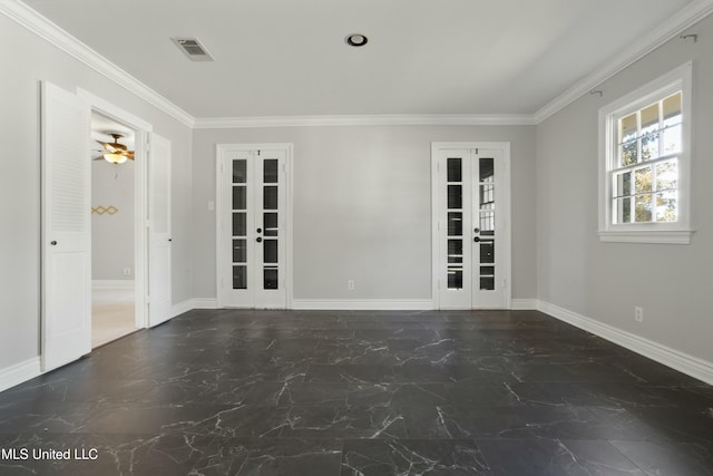 spare room featuring french doors, ceiling fan, and crown molding