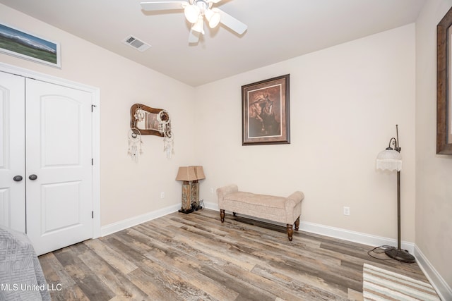 unfurnished room with hardwood / wood-style floors and ceiling fan