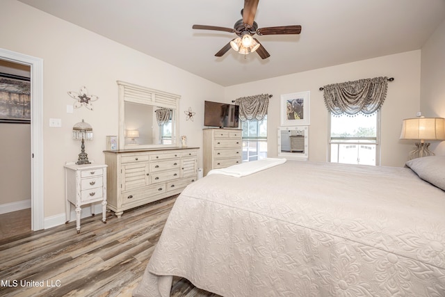 bedroom featuring ceiling fan and light wood-type flooring