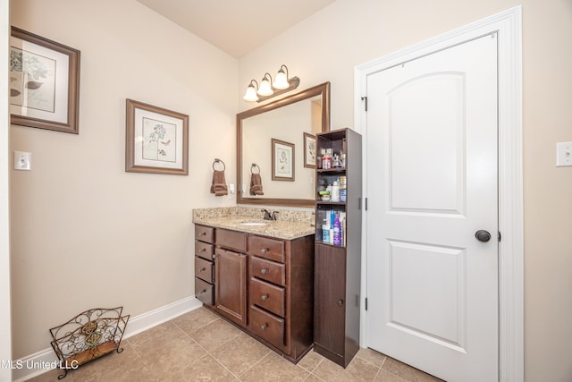 bathroom featuring tile patterned floors and vanity