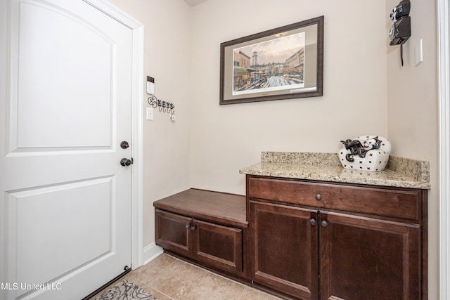 mudroom featuring light tile patterned floors