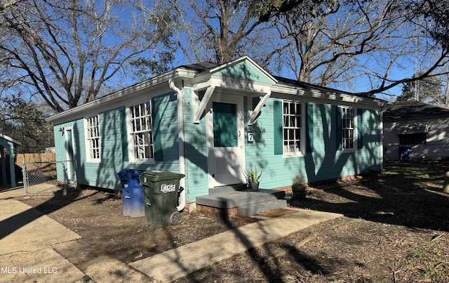 view of front of home with fence