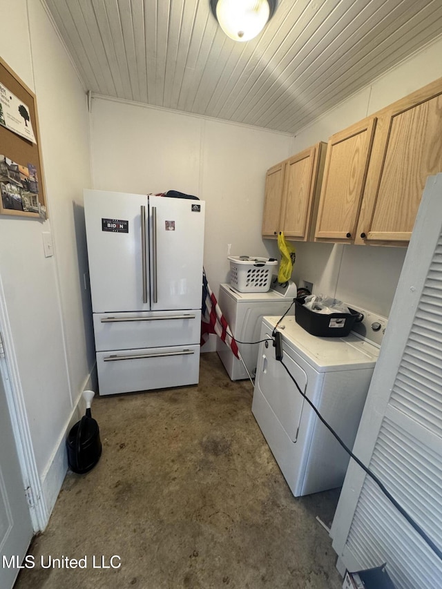 washroom with cabinet space, wood ceiling, and independent washer and dryer