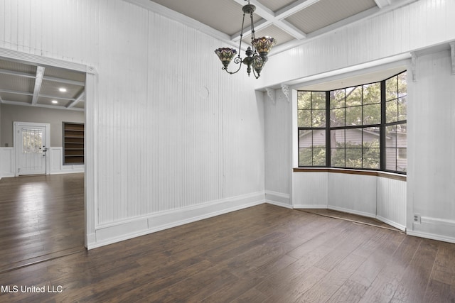 208 Washington Ave, Ocean Springs, MS 39564 - unfurnished dining area featuring coffered ceiling, dark wood-type flooring, beam ceiling, a chandelier, and a decorative wall