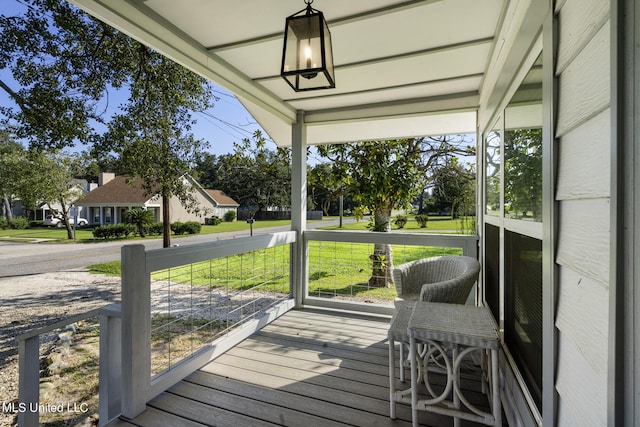 sunroom featuring a wealth of natural light