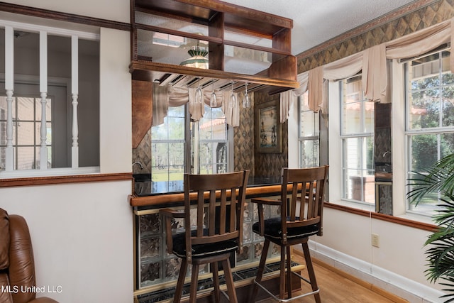 bar featuring hardwood / wood-style floors