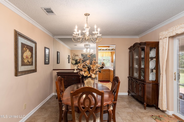 tiled dining space featuring a notable chandelier, ornamental molding, and a textured ceiling