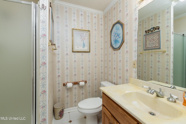 bathroom with a textured ceiling, toilet, ornamental molding, vanity, and an enclosed shower