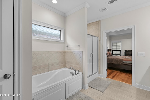 bathroom with crown molding and plus walk in shower