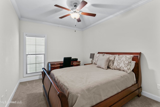 carpeted bedroom featuring ceiling fan and crown molding