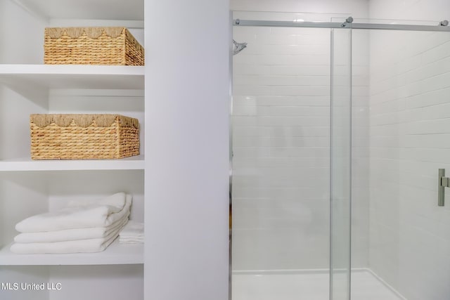 bathroom with an enclosed shower