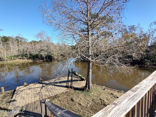 view of dock with a water view