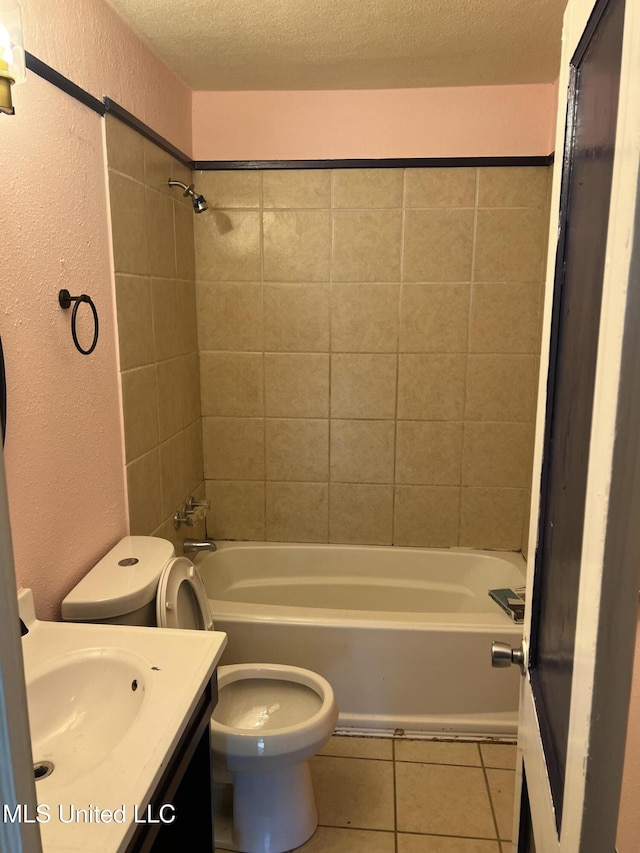 3258 Meadow Ln, Jackson, MS 39212 - bathroom featuring tile patterned floors, vanity, a textured wall, shower / bath combination, and a textured ceiling