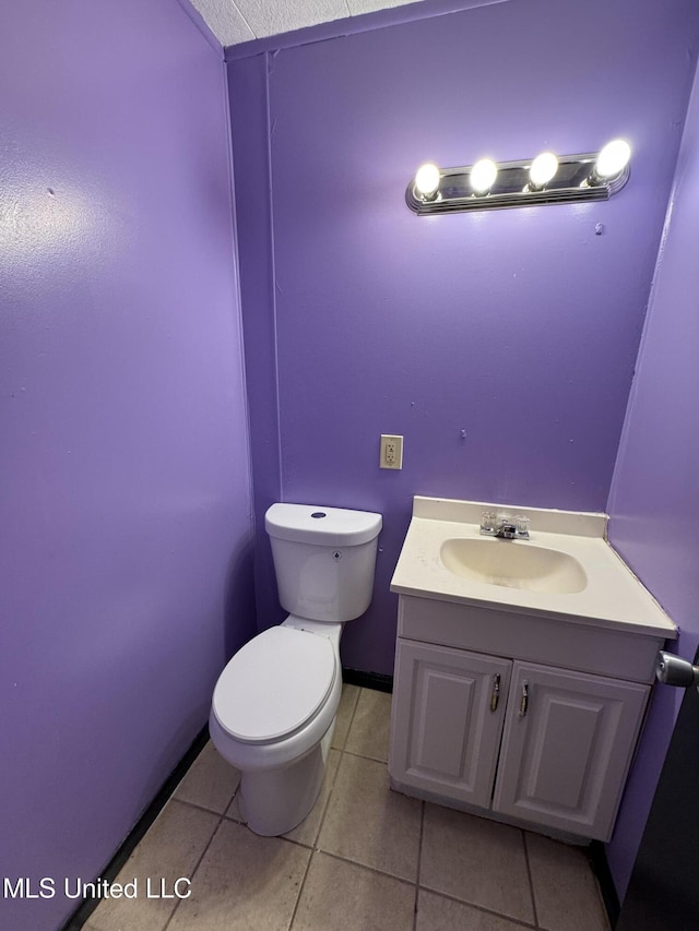 3258 Meadow Ln, Jackson, MS 39212 - half bathroom featuring vanity and tile patterned flooring
