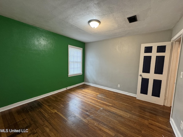 3258 Meadow Ln, Jackson, MS 39212 - empty room with hardwood / wood-style floors and a textured ceiling