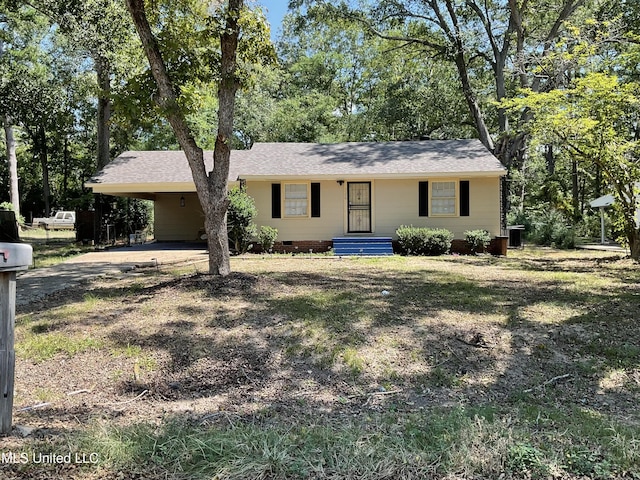 3258 Meadow Ln, Jackson, MS 39212 - ranch-style house with crawl space, an attached carport, a shingled roof, and driveway