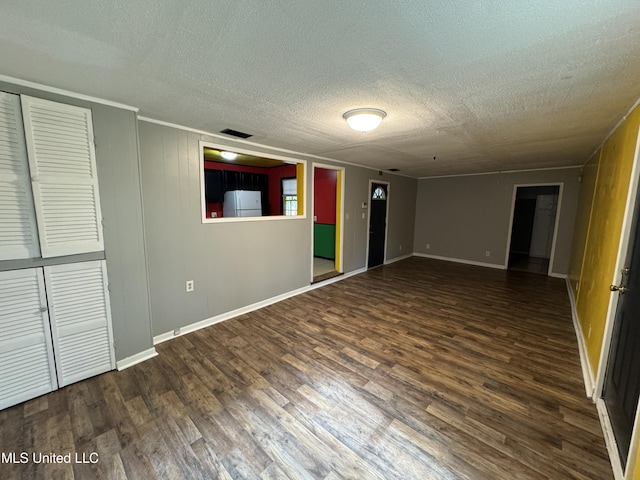 3258 Meadow Ln, Jackson, MS 39212 - empty room featuring wood finished floors and a textured ceiling