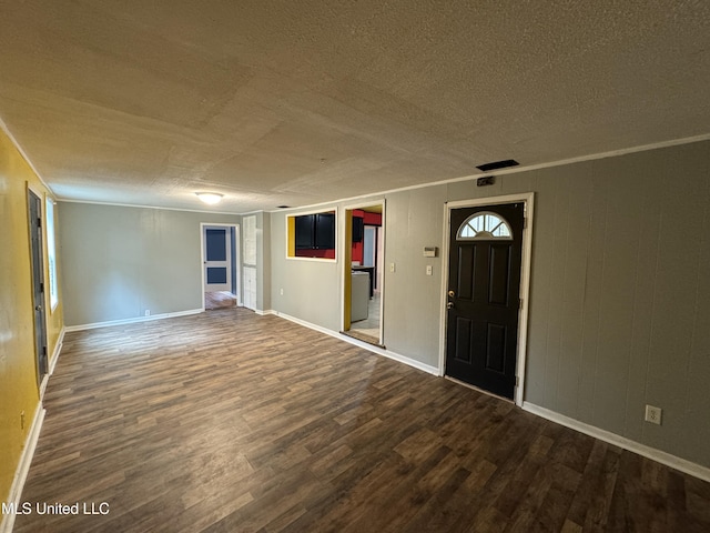 3258 Meadow Ln, Jackson, MS 39212 - foyer with dark wood finished floors and a textured ceiling