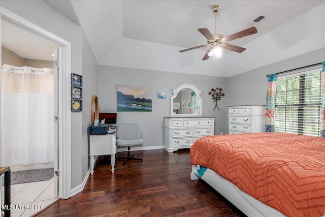 7488 Hickory Estates Dr, Walls, MS 38680 - bedroom with a ceiling fan, visible vents, wood finished floors, baseboards, and lofted ceiling