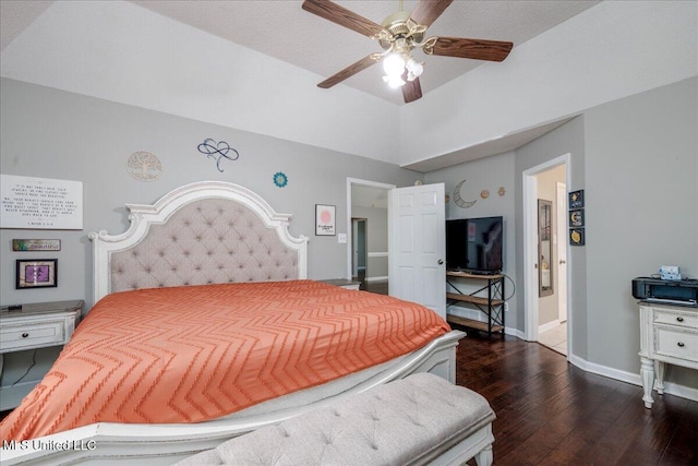 7488 Hickory Estates Dr, Walls, MS 38680 - bedroom featuring dark wood-type flooring, a ceiling fan, baseboards, and ensuite bathroom