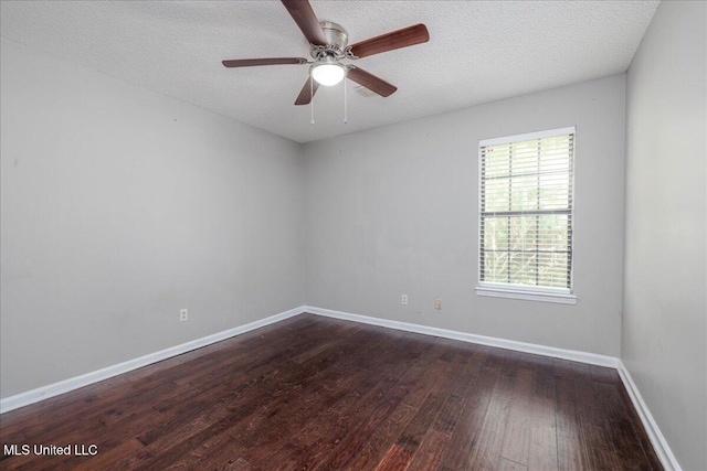 7488 Hickory Estates Dr, Walls, MS 38680 - unfurnished room featuring a textured ceiling, baseboards, a ceiling fan, and wood finished floors