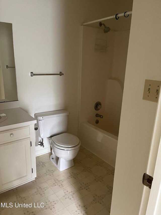 full bath featuring tile patterned floors, toilet, vanity, and shower / bath combination