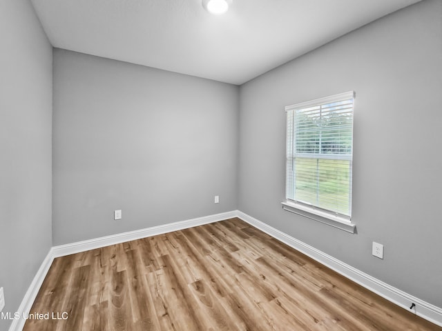 16814 W Landon Green Dr, Gulfport, MS 39503 - spare room featuring wood finished floors and baseboards