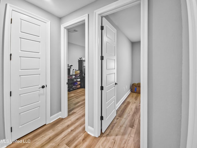 16814 W Landon Green Dr, Gulfport, MS 39503 - hallway featuring light wood finished floors